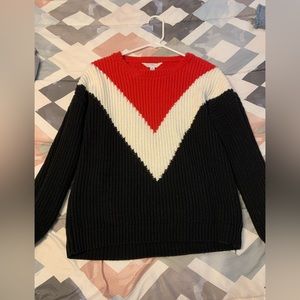 Red, white, and black sweater